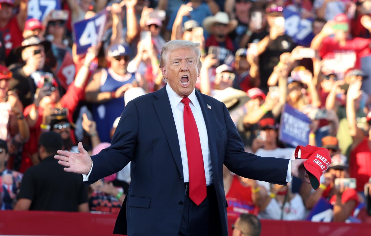 Man arrested outside Trump Coachella rally illegally had shotgun, handgun, officials say