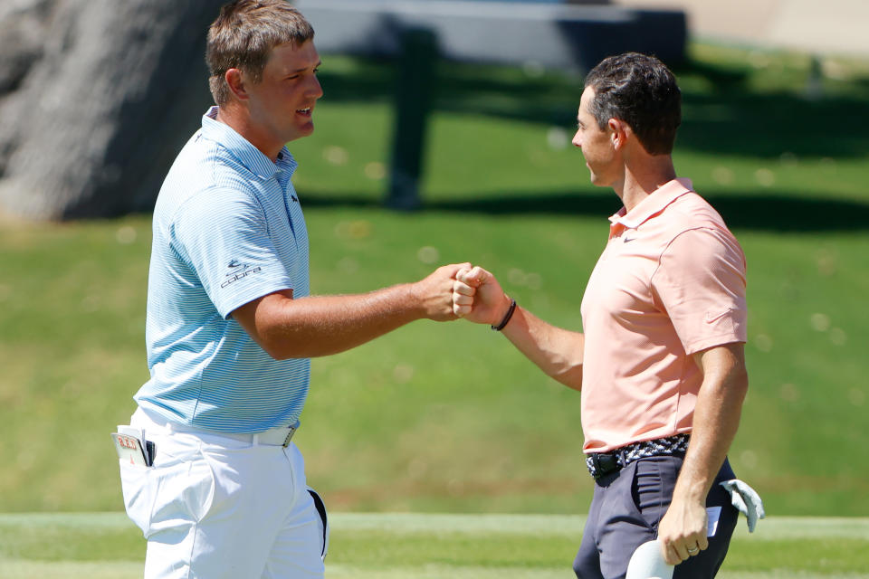 Bryson DeChambeau and Rory McIlroy, seen here in 2020, will meet once again on the golf course this December. (Tom Pennington/Getty Images)