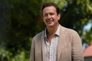 Jason Segel as Jimmy Laird, standing outdoors, in 'Shrinking.'