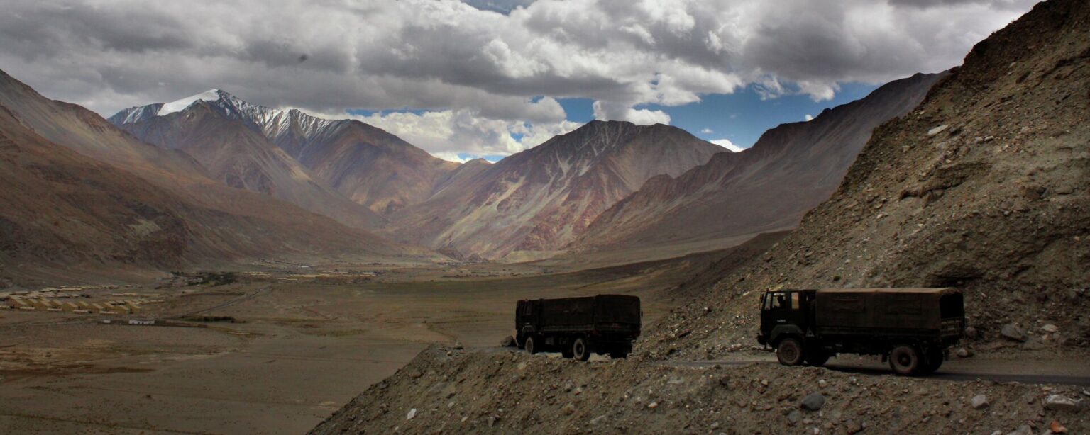 In this Sept. 14, 2017, file photo, Indian army trucks drive near Pangong Tso lake near the India China border in India's Ladakh area. - Sputnik International, 1920, 22.10.2024