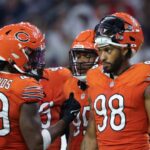 Bears defensive end Montez Sweat (98) talks with linebacker Tremaine Edmunds (49) during a break in the third quarter against the Texans on Sept. 15, 2024, at NRG Stadium in Houston. (John J. Kim/Chicago Tribune)