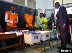 Daniel Chapo, presidential candidate of the ruling Frelimo party, casts his vote during the general elections in Inhambane, in the southern Mozambique, Oct. 9, 2024.