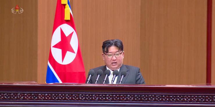 North Koreas' leader Kim Jong-un speaks at a Supreme People's Assembly meeting held the previous day in Pyongyang, in this photo captured from footage of North Korea's state-run Korean Central Television, Jan. 16. Newsis