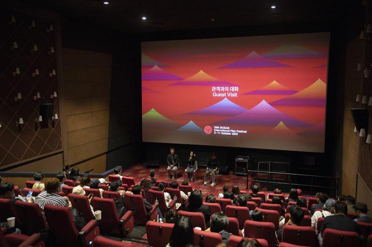 Game developers featured in the documentary 'Save the Game' engage with the audience during a guest visit event at Lotte Cinema Centum City in Busan, Oct. 5. Courtesy of Nexon Foundation