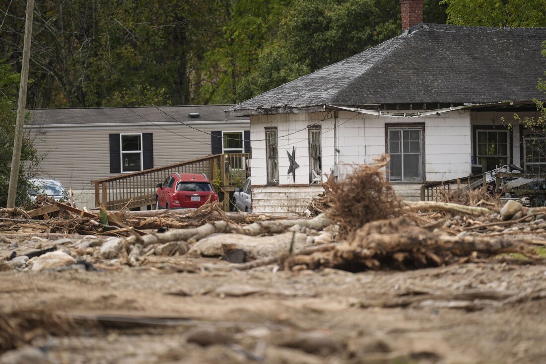 Homes lie in a debris field in the aftermath of Hurricane Helene, Thursday, Oct. 3, 2024, in Pensacola, N.C.