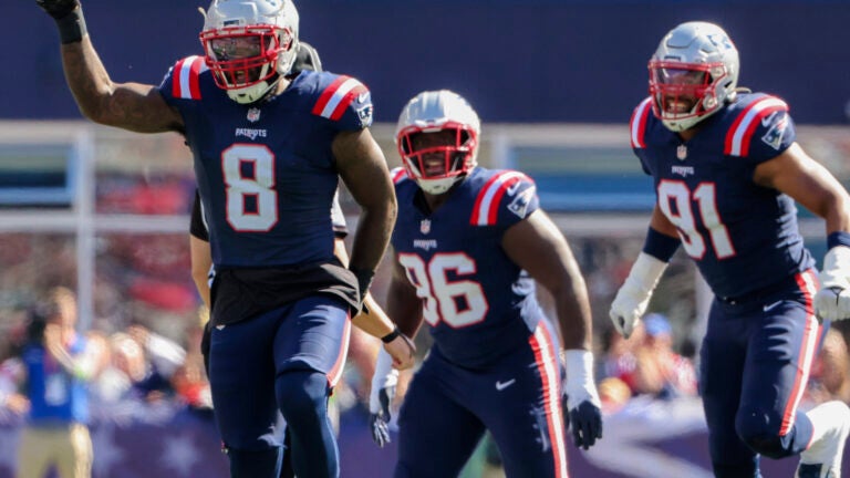 New England Patriots Ja’Whaun Bentley celebrates after sacking New Orleans Saints Derek Carr during first quarter NFL action at Gillette Stadium.