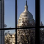 The U.S. Capitol is seen through a window in the Russell Senate Office Building in Washington, March 15, 2023.  - Sputnik International, 1920, 26.09.2024