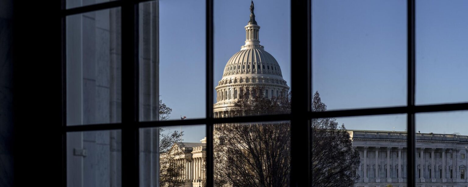 The U.S. Capitol is seen through a window in the Russell Senate Office Building in Washington, March 15, 2023.  - Sputnik International, 1920, 26.09.2024