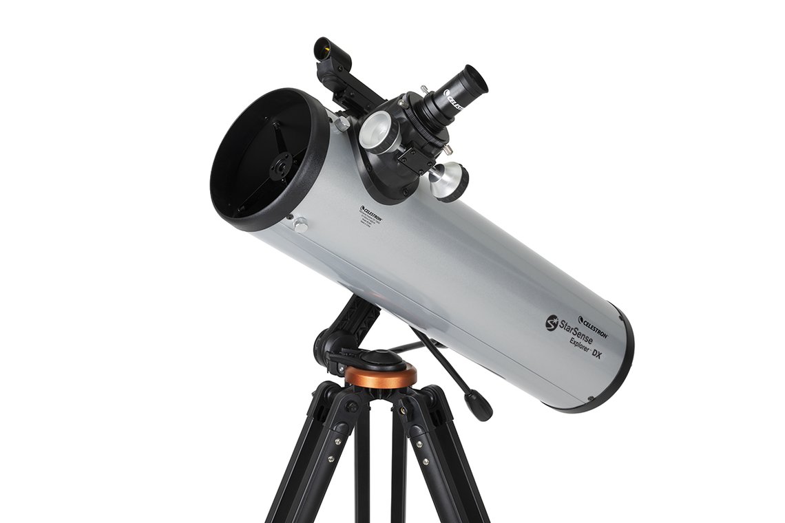 Celestron StarSense Explorer DX 130AZ with a silver finish on a black tripod infront of a white background