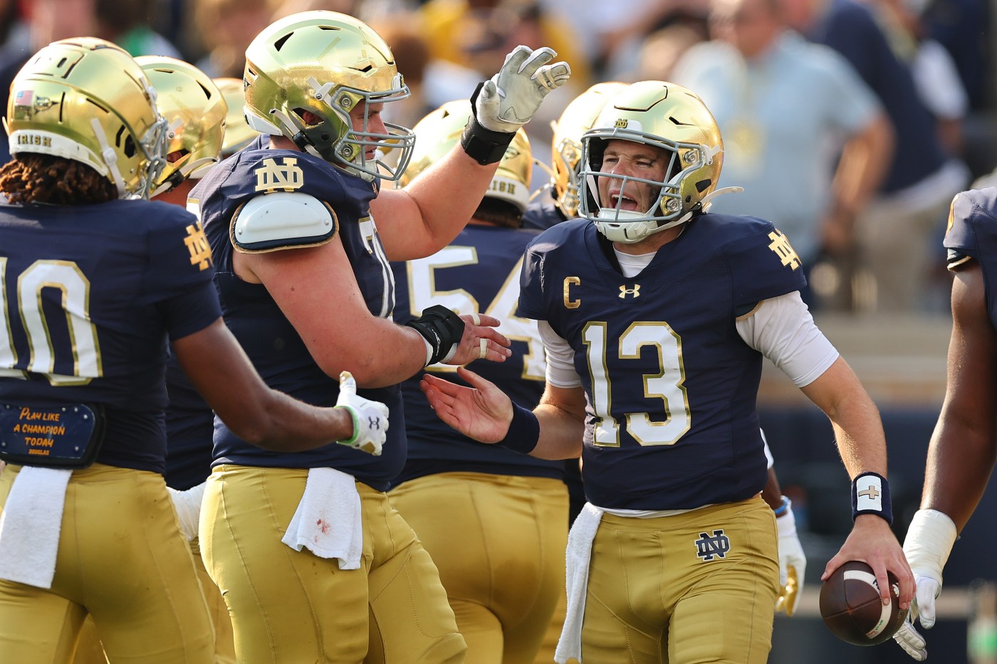 Riley Leonard throws for 3 touchdowns and runs for another score in No. 11 Notre Dame’s 49-7 rout of Stanford