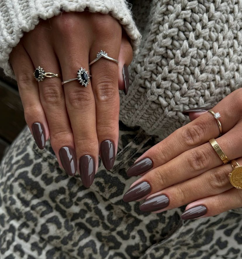 Dark chocolate brown nails are on-trend for winter 2025.