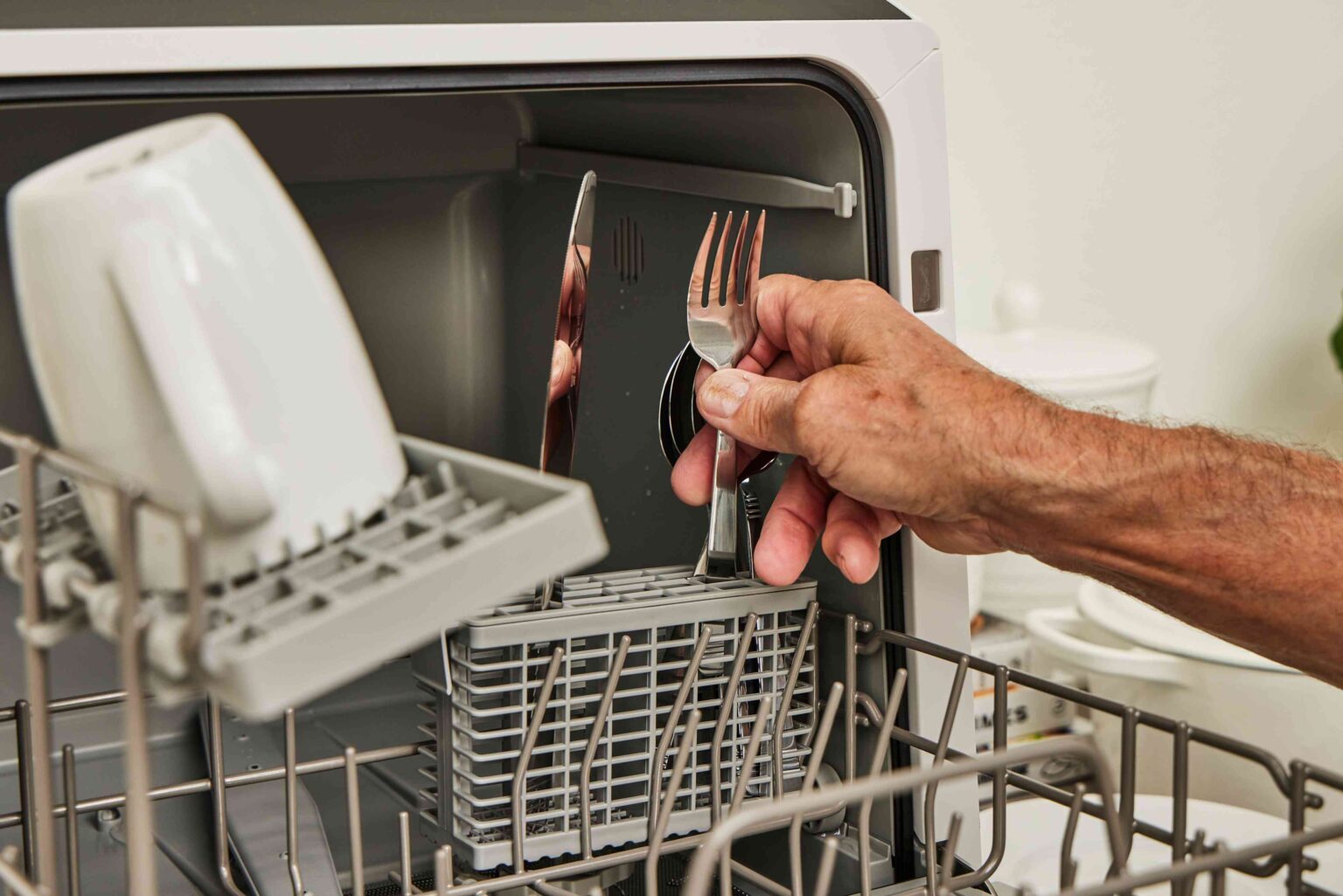 Should You Point Silverware Up or Down in the Dishwasher? We Asked a Chef to Explain