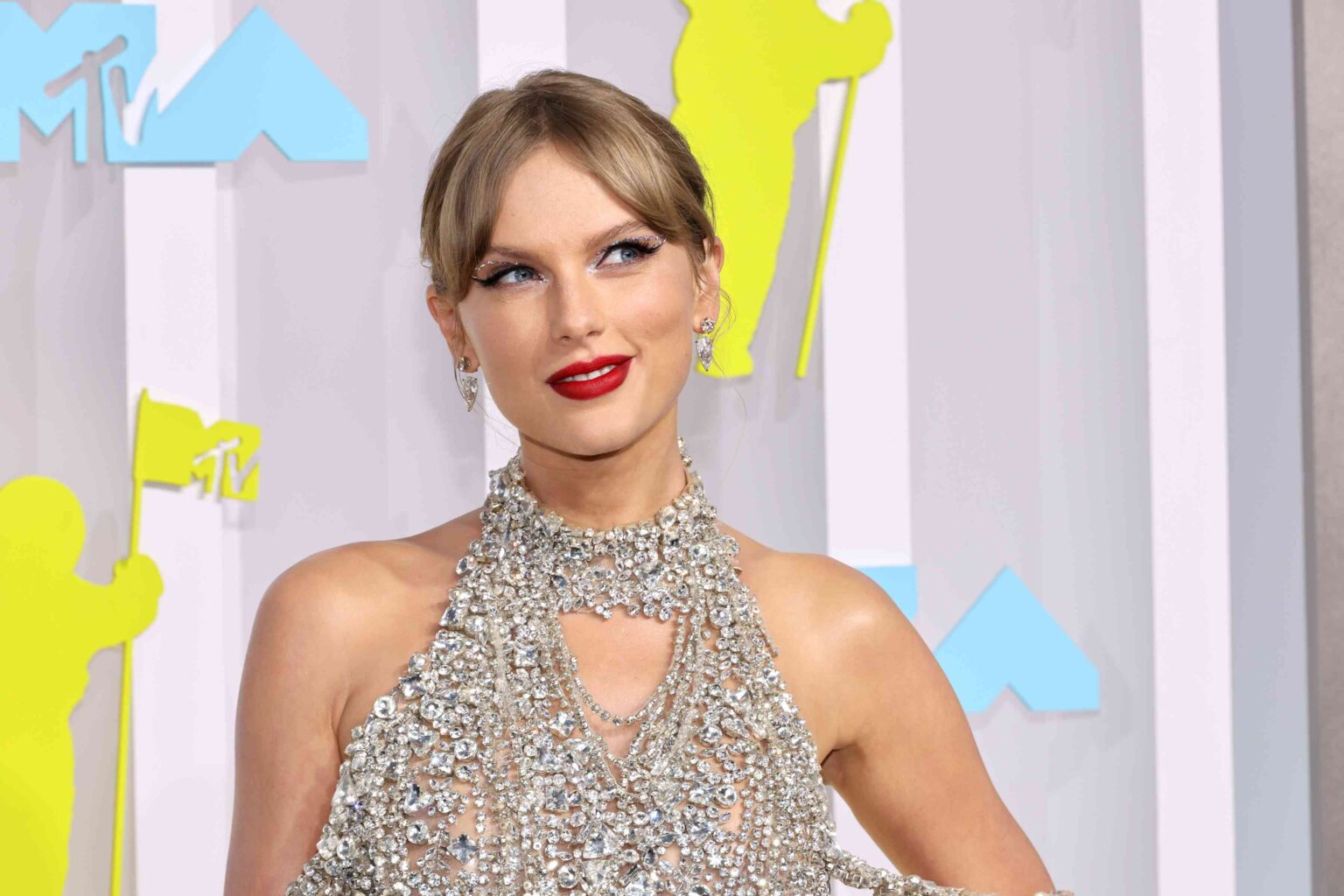 Taylor Swift's Gold Lace Wedding Guest Dress Looked Straight Out of a Fairy Tale