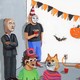 A halloween party with several characters standing around in different meme costumes. Stonks guy, Brat Summer, Doge, Distracted Boyfriend and Dancing Baby are in attendance.