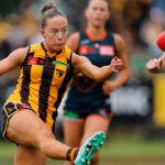 Hawthorn’s Jasmine Fleming boots clear.