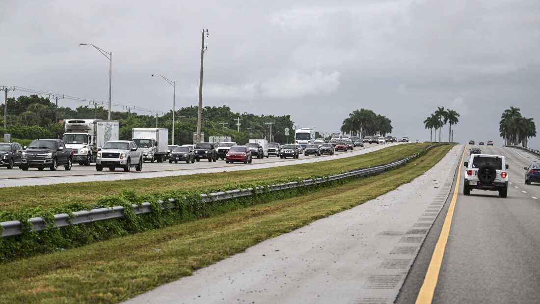 Cars drive east out of Naples, Fla., toward Miami on Tuesday as Hurricane Milton approaches.