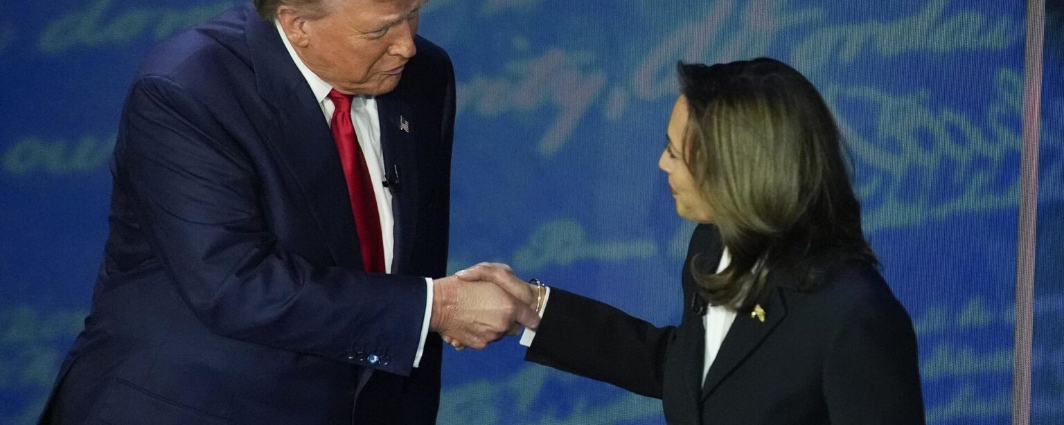 Republican presidential nominee former President Donald Trump and Democratic presidential nominee Vice President Kamala Harris shake hands before the start of an ABC News presidential debate at the National Constitution Center, Tuesday, Sept. 10, 2024, in Philadelphia.  - Sputnik International, 1920, 10.10.2024