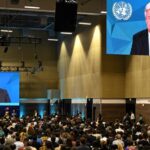 U.N. chief Antonio Guterres is projected on big screens  during the opening ceremony of the COP16 summit in Cali, Colombia, Oct. 20. AFP-Yonhap