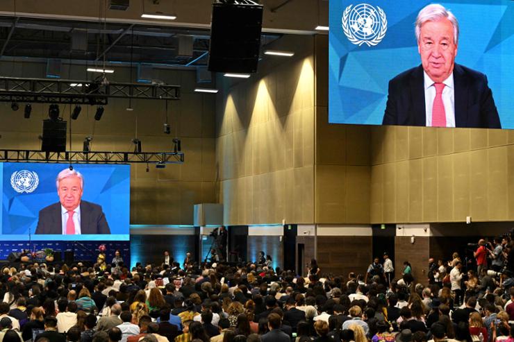 U.N. chief Antonio Guterres is projected on big screens  during the opening ceremony of the COP16 summit in Cali, Colombia, Oct. 20. AFP-Yonhap