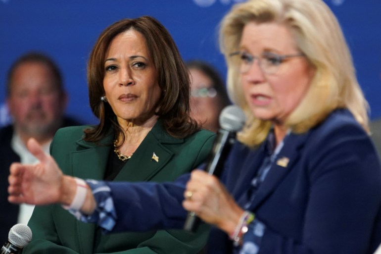 Kamala Harris attends a conversation with Liz Cheney