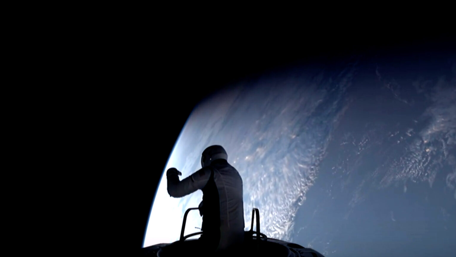 a spacesuited astronaut emerges from the hatch of a white space capsule, with earth in the background