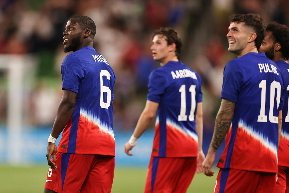 AUSTIN, TEXAS - OCTOBER 12: Yunus Musah (L) #6 of United States looks on with his teammates after scoring the first goal of their team during friendly match between United States and Panama at Q2 Stadium on October 12, 2024 in Austin, Texas. (Photo by Omar Vega/Getty Images)