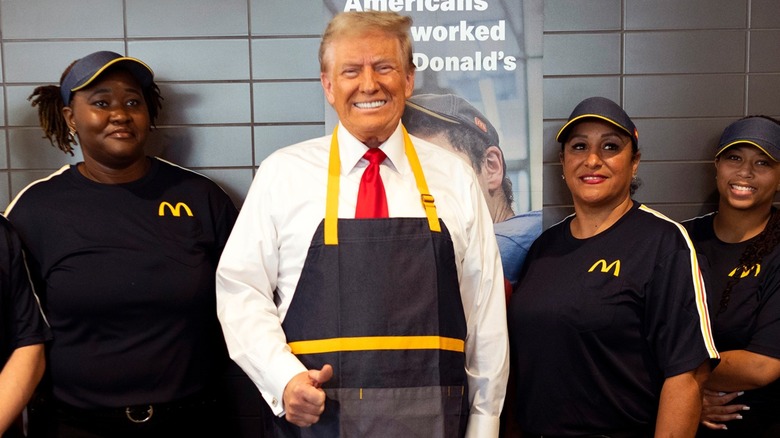 Donald Trump posing with McDonald's employees