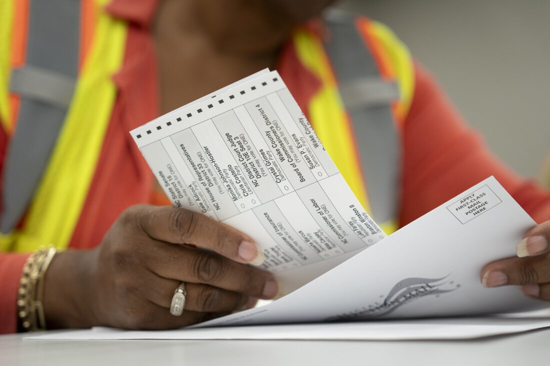 Absentee ballots are prepared to be mailed at the Wake County Board of Elections on Sept. 17 in Raleigh, N.C.