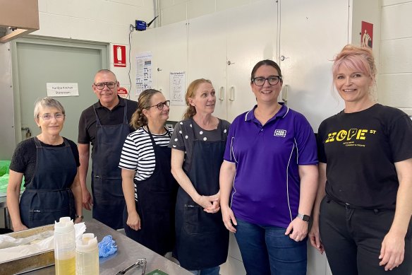 Foodbank Queensland chief executive Jess Watkinson (second from right) at a community lunch in West End for the launch of the 2024 Hunger Report during Anti-Poverty Week, October 13 to 19.