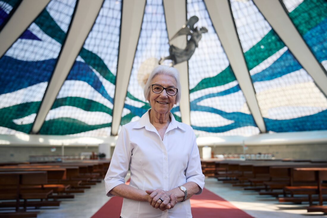 Sister Rosita Milesi, who is the Global Laureate of the 2024 UNHCR Nansen Refugee Award, stands inside the Catedral Metropolitana de Brasilia in the centre of the Brazilian capital. She has been a member of the Congregation of the Missionaries of Saint Charles Borromeo, or Scalabrinian missionaries, for more than 60 years. The Congregation is renowned for its global work with refugees and migrants. Sister Rosita is currently a member of the board of directors of the Scalabrinian Foundation. Throughout her life, her faith has guided her work to support refugees and migrants. Sister Rosita, whose organization, the Institute for Migration and Human Rights (IMDH) has been providing legal and social assistance in Brazil to people forced to flee for more than 25 years, is being honoured for her commitment over the past four decades to supporting and advocating for refugees. “From one moment to the next, they find themselves in a place with a different language, a different culture, different traditions, knowing that they have lost everything they once had, and now have to start a new life,” says Sister Rosita. ; Sister Rosita Milesi is the Global Laureate of the 2024 UNHCR Nansen Refugee Award. The founder and Director of the Institute for Migration and Human Rights (IMDH), which has provided legal and social assistance to refugees, asylum-seekers, migrants and others in need of international protection in Brazil for more than 25 years, Sister Rosita is being recognized for her leadership and tireless work over the past four decades to assist refugees and help shape Brazil’s inclusive legislation and policies towards people forced to flee. As of April 2024, Brazil hosts more than 731,000 people in need of international protection. Most refugees come from Venezuela, through the northern state of Roraima, while others have arrived with humanitarian visas from Afghanistan, Haiti, Syria, and Ukraine, mainly through São Paulo international airport. In recent years,