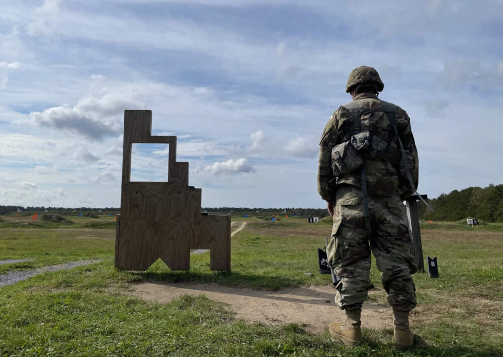 A guardsman waits to fire on the Sierra Range at Camp Edwards on Joint Base Cape Cod in October, 2021. It is a 300 meter automated rifle qualification range where soldiers are tested on rifle marksmanship. (Eve Zuckoff/CAI)