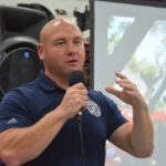 Oak Forest firefighter/paramedic and Project Fire Buddies Executive Director Kurt DeGroot speaks Oct. 20, 2024, at the watch party for Reyna Arreguin. (Jeff Vorva/for the Daily Southtown)