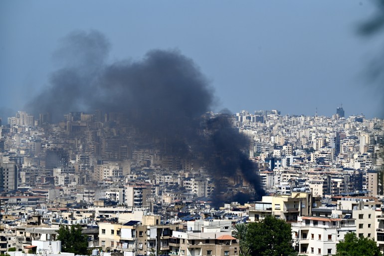 Smoke billows from targeted areas after Israeli airstrikes on Lebanon